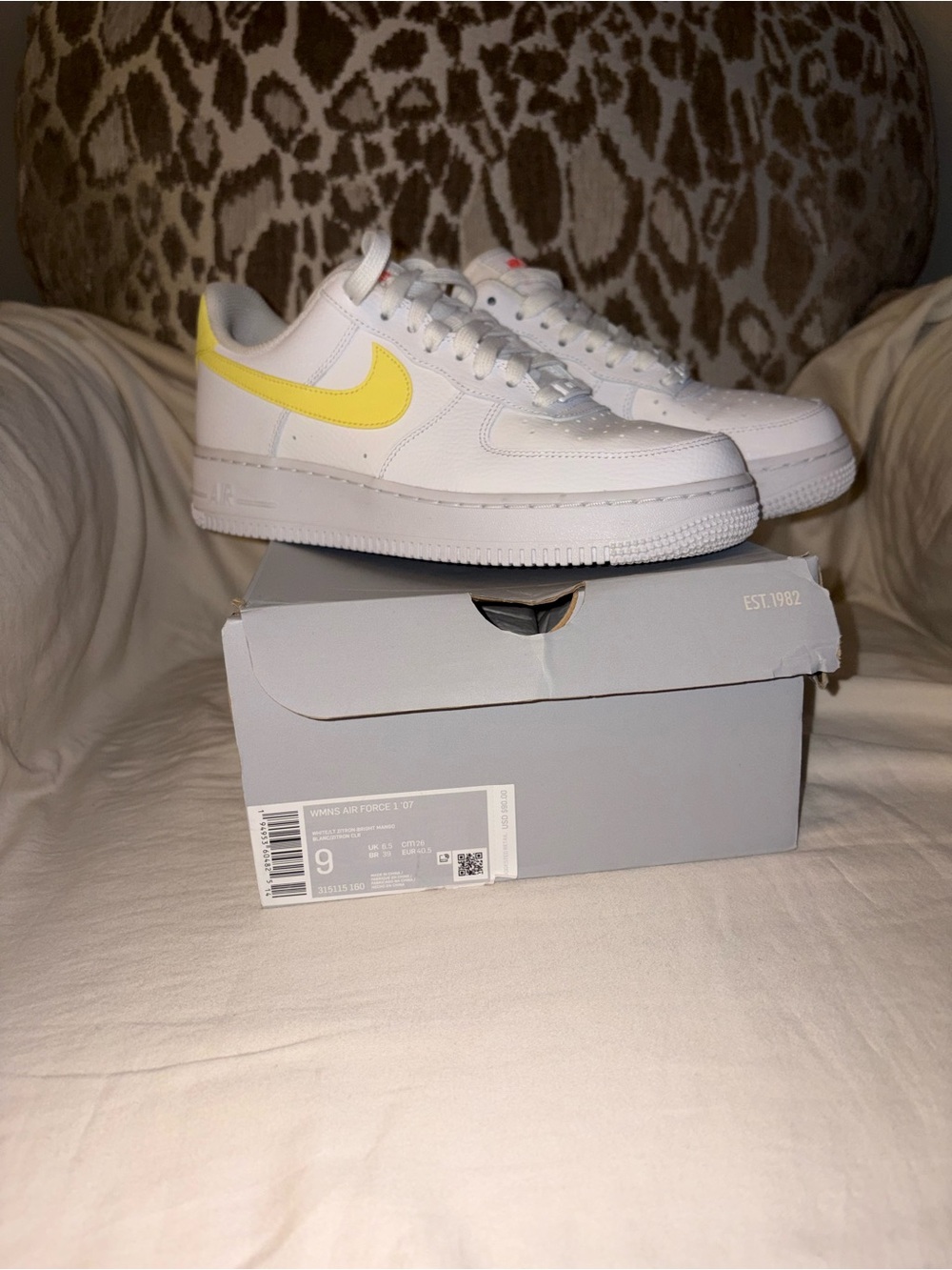 Nike Air Force 1s - White Low-Top Sneakers with Yellow Swoosh - Picture 2 of 3